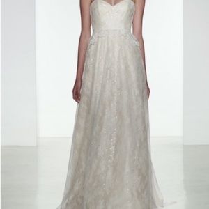 Never worn Christo’s Chantilly lace wedding gown